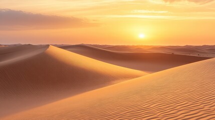 Serene Sunset Over Golden Sand Dunes in a Tranquil Desert Landscape