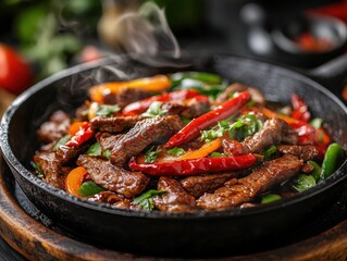 Delicious sizzling beef and veggies in a cast iron skillet with steam