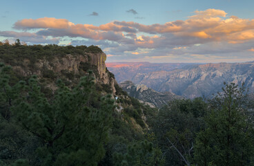 Copper Canyon Sunset with Lush Greenery and Dramatic Clouds