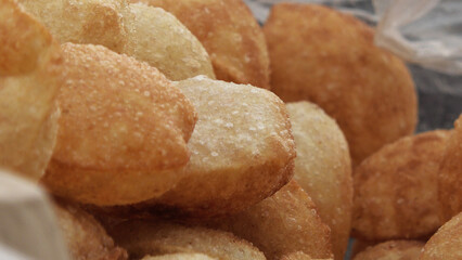 Crispy Indian snack 'Pani puri' displayed in a street food shop