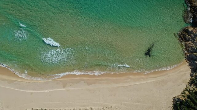 Aerial view of Spiaggia di Monte Cogoni with beautiful sandy beach and tranquil turquoise sea, Domus de Maria, Sardinia, Italy.