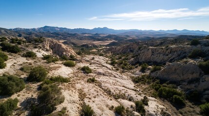 Stunning panoramic view of rugged mountains and valleys under a clear blue sky : Generative AI