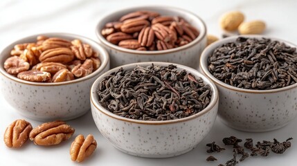 Assorted nuts and tea in small bowls
