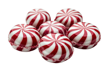 Red and white peppermint candies on clear bg