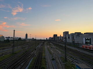 Orange sunset over Munich's Stammstrecke, main train line, railway tracks, Munich, Bavaria,...