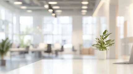 Blurred view of a spacious white openplan office interior suitable as a neutral background