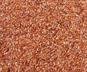 Brown flax seeds background texture