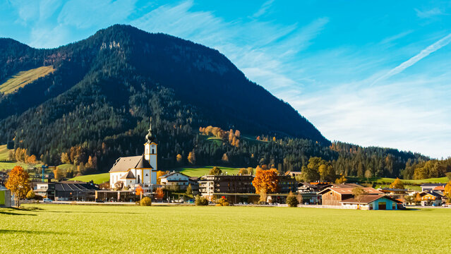 Alpine autumn or indian summer view with a church near Soell, Kufstein, Tyrol, Austria