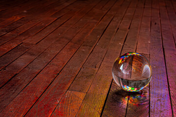 Crystal Ball on Wooden Floor