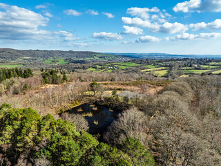 Farms and Woods over East Dartmoor National Nature Reserve from a drone, Yarner Wood, Lustleigh,...