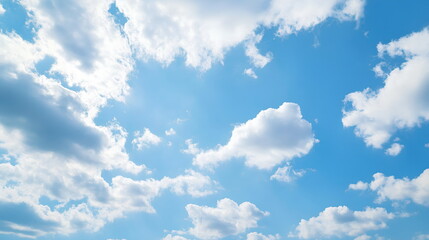 Naklejka premium Serene Blue Sky with Fluffy White Clouds