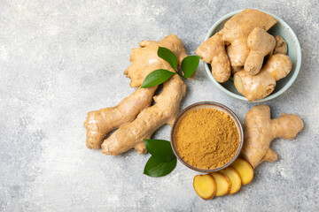 Fresh ginger on wooden background. Dry ginger. Sliced ​​ginger with honey and lemon. Ginger...