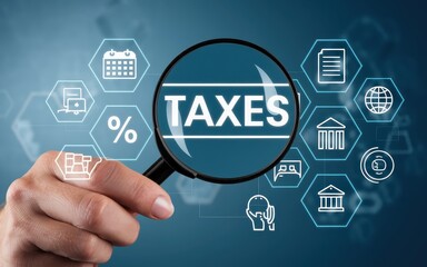 Fototapeta premium Magnifying Taxes: A Comprehensive Overview of Tax Systems