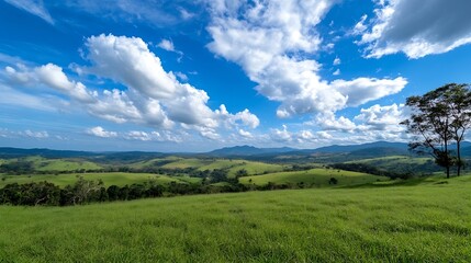 Expansive landscape showcasing lush green hills under a bright blue sky with clouds : Generative AI