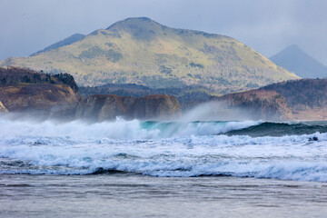 Pacific Ocean coast, rocks and waves. Kunashir. South Kurils
