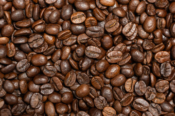 Decaffeinated coffee beans roasted close up