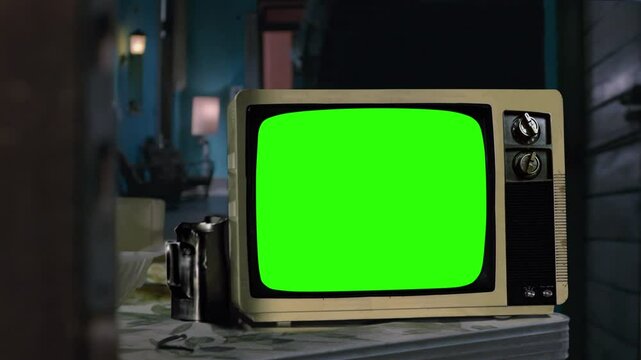 Remote Control Turning On an Old TV With Green Screen, Zoom In at the End, 100% Real and Not AI-Generated - 4K