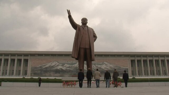 Western tourists in Mansudae Grand monument, Pyongyang, North Korea