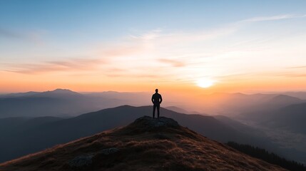 Fototapeta premium Person standing on a mountain peak during sunset overlooking scenic valleys and hills : Generative AI