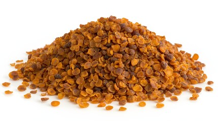 Heap of Brown Chili Flakes on White Background for Culinary Use in Cooking and Seasoning