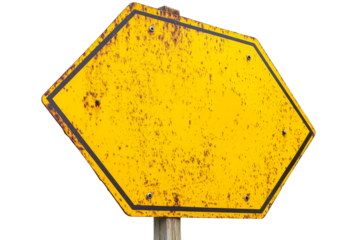 Weathered yellow sign on wooden post with no text