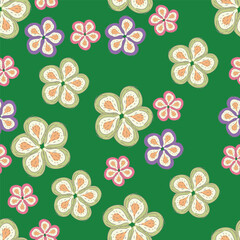 Vintage seamless floral pattern. Ditsy style background of small flowers. Ditsy floral over light yellow background. Small flower pattern for fashion, wrapping, printing on fabrics and surface