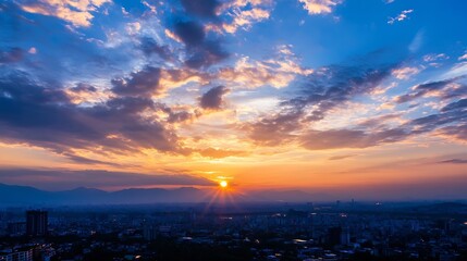 Fototapeta premium Gorgeous sunset over a sprawling cityscape with clouds and mountains in the background : Generative AI