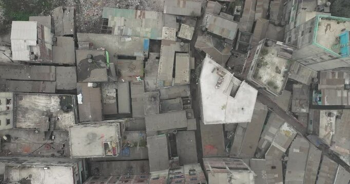 Aerial view of densely populated urban landscape with rooftops and buildings, Dhaka, Dhaka Province, Bangladesh.