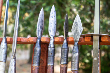 Iron spearheads of various shapes with wooden handles