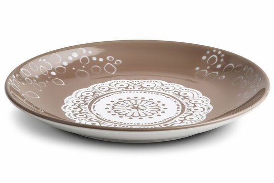 A plate with a white and brown design on it