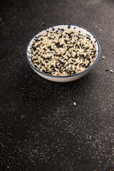 Sesame spice mix white and black tasty fresh gourmet food background on table rustic food top view copy space keto and paleo diet vegetarian and vegan food