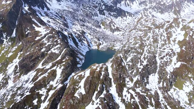 Aerial drone view of Rheinquelle Tomasee, Oberalp Pass, Canton Uri, Switzerland