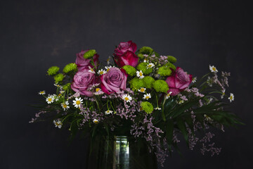  Beautiful bunch of flowers isolated against dark background