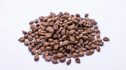 Fototapeta premium Close-Up View of Brown Seed Pile on White Background