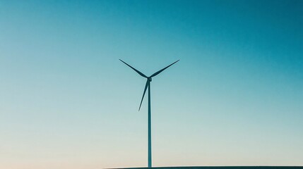 Wind turbine against a clear sky provides sustainable energy solution