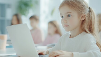 Young girl focused on laptop, bright classroom setting, engaged in learning activities, ideal for educational themes.