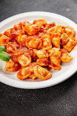 Ravioli tomato sauce delicious gourmet food background on the table rustic food top view copy space