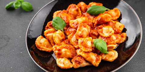 Ravioli tomato sauce delicious gourmet food background on the table rustic food top view copy space