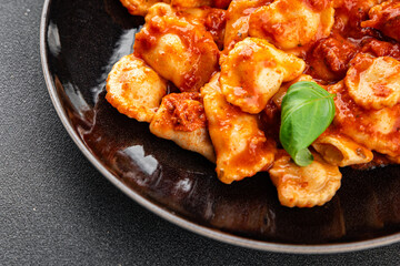 Ravioli tomato sauce delicious gourmet food background on the table rustic food top view copy space