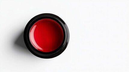 An open ointment tube placed on a white background, viewed from the top. 