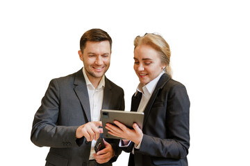 Colleagues collaborating on a tablet while discussing a project in a professional setting