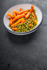Green peas and carrot canned food tasty fresh delicious gourmet food background table rustic food top view copy space keto and paleo diet vegetarian and vegan food