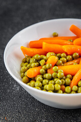 Green peas and carrot canned food tasty fresh delicious gourmet food background table rustic food top view copy space keto and paleo diet vegetarian and vegan food