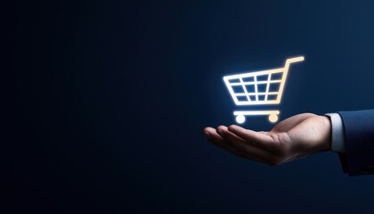 Businessmans hand holding a glowing online shopping cart symbol, representing the future of e-commerce and digital retail solutions