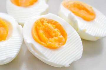ฺBoiled egg on a white plate. Healthy and dietary food.