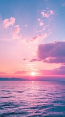 beautiful sunset with pink and purple clouds on the sea, ideal for an mobile phone wallpaper, phone background, or screen