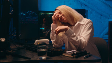 Businesswoman girl Caucasian woman business female crypto currency trade bitcoin investor programmer late night work tired exhausted overtime headache itchy eyes tension overwork computer bad eyesight