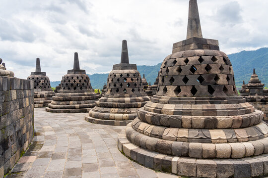 Pagodas in Borobudur Temple, UNESCO world heritage in Java, Indonesia. Borobudur Temple is the largest Buddhist temple in the world.