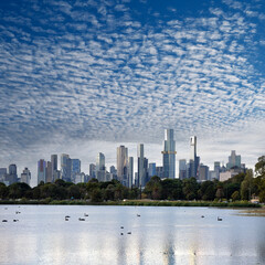 stunning Melbourne skyline while sunset reflected in the Albert Park Lake, Melbourne, Australia