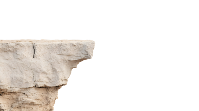 Elevated rock formation against a dark background. The light colored stone platform has a textured surface and visible cracks adding to its natural look.